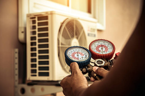 Professional Air Conditioning Service technician working in Lexington, VA